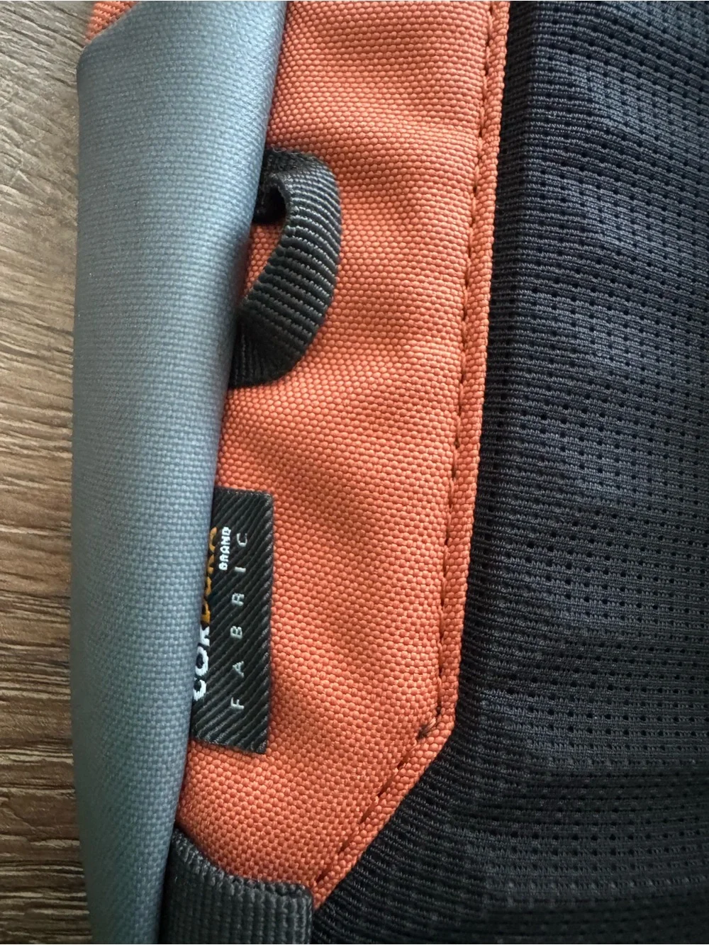 Orvis Orange and Gray Sling Backpack with Black Accents